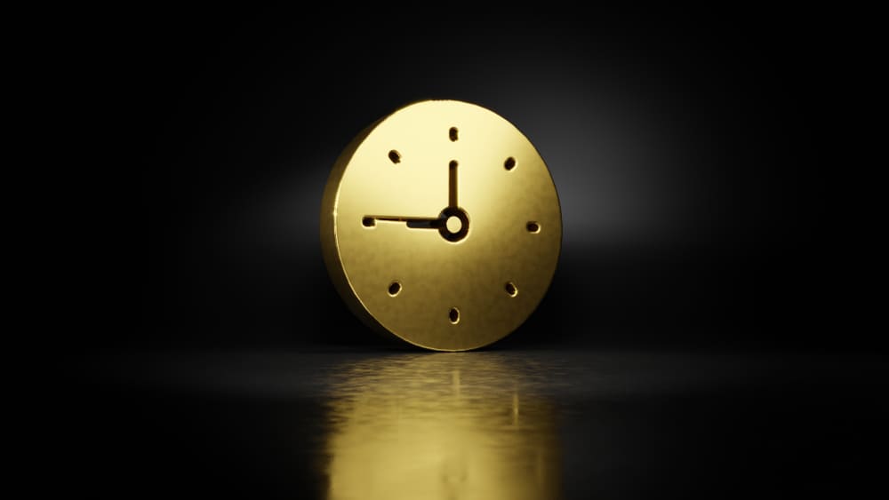 The moon phase in watchmaking: what it is and how it works Gold metal symbol of wall clock 3D rendering with blurry reflection on floor with dark background